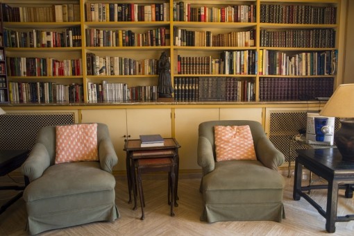 Small library with arm chairs